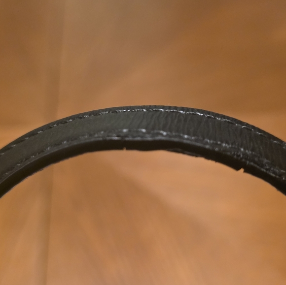 DKNY Bryant Medium Zippered Tote Bag in black leather with gold-tone hardware.  - Picture 13 of 17